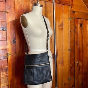 Leather cross body purse.